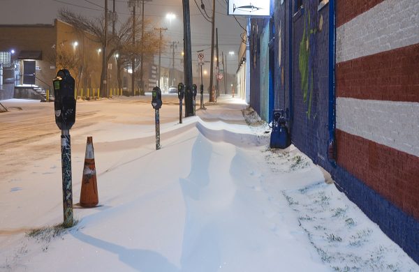 Deep Ellum sidewalk covered with snow in Dallas snow storm