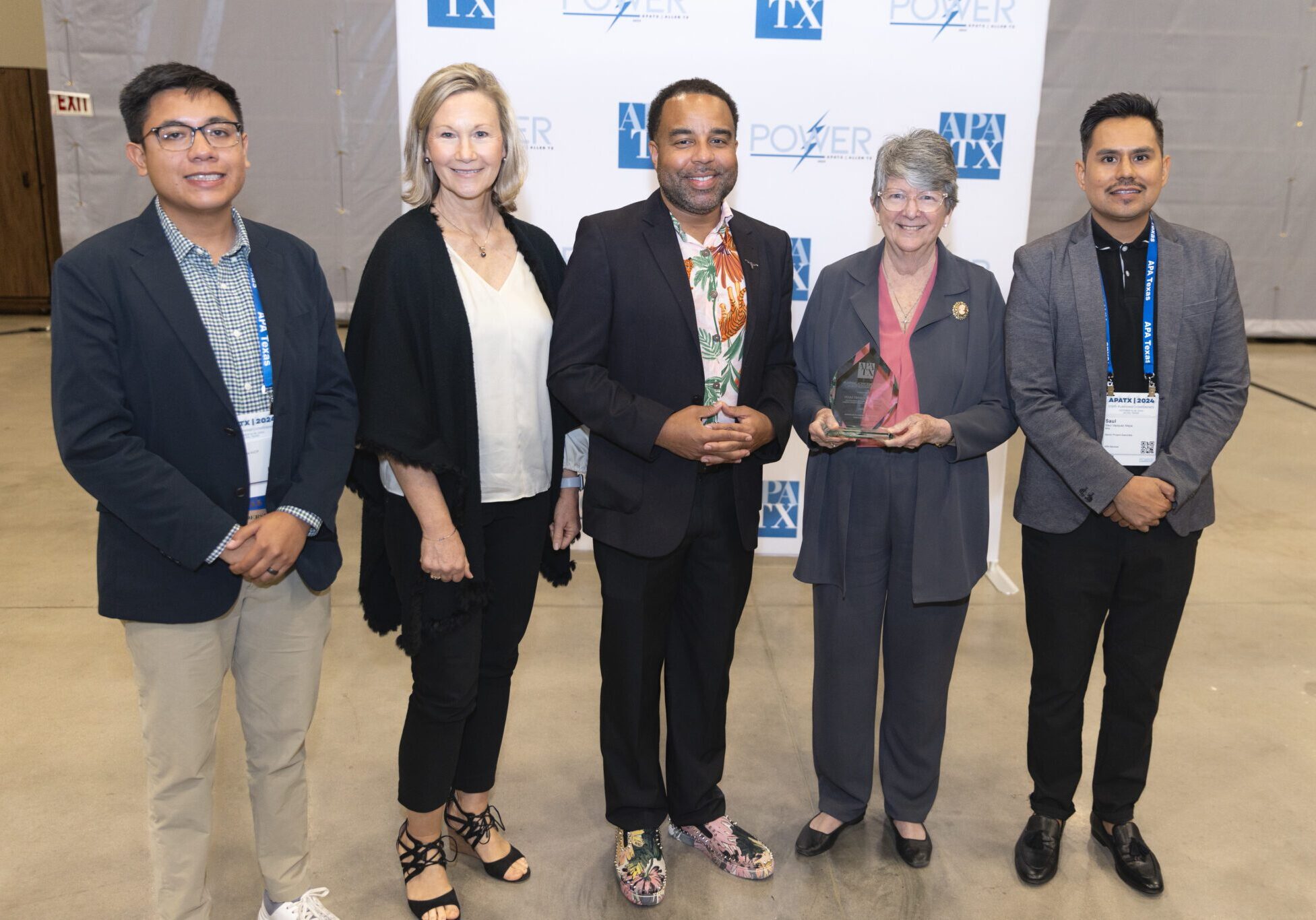 The Texas Trees and MIG team accept their award at the APATX State Planning Conference in Allen in October.